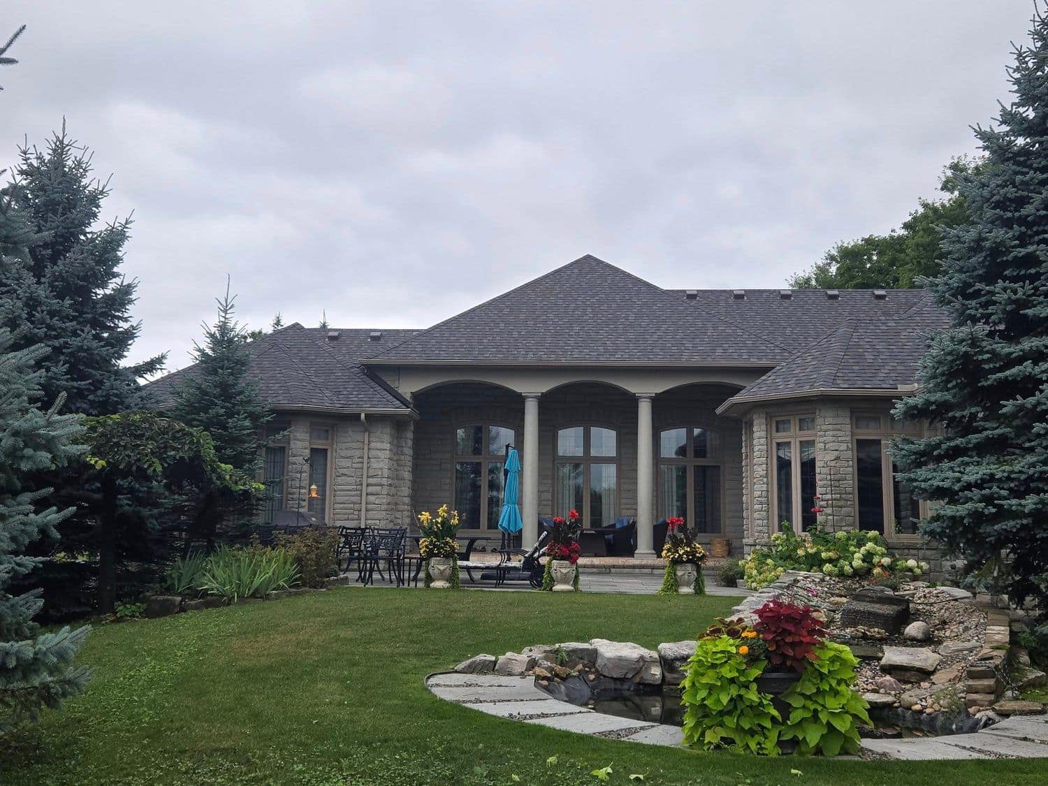 Fresh roof on a bungalow with manicured landscaping