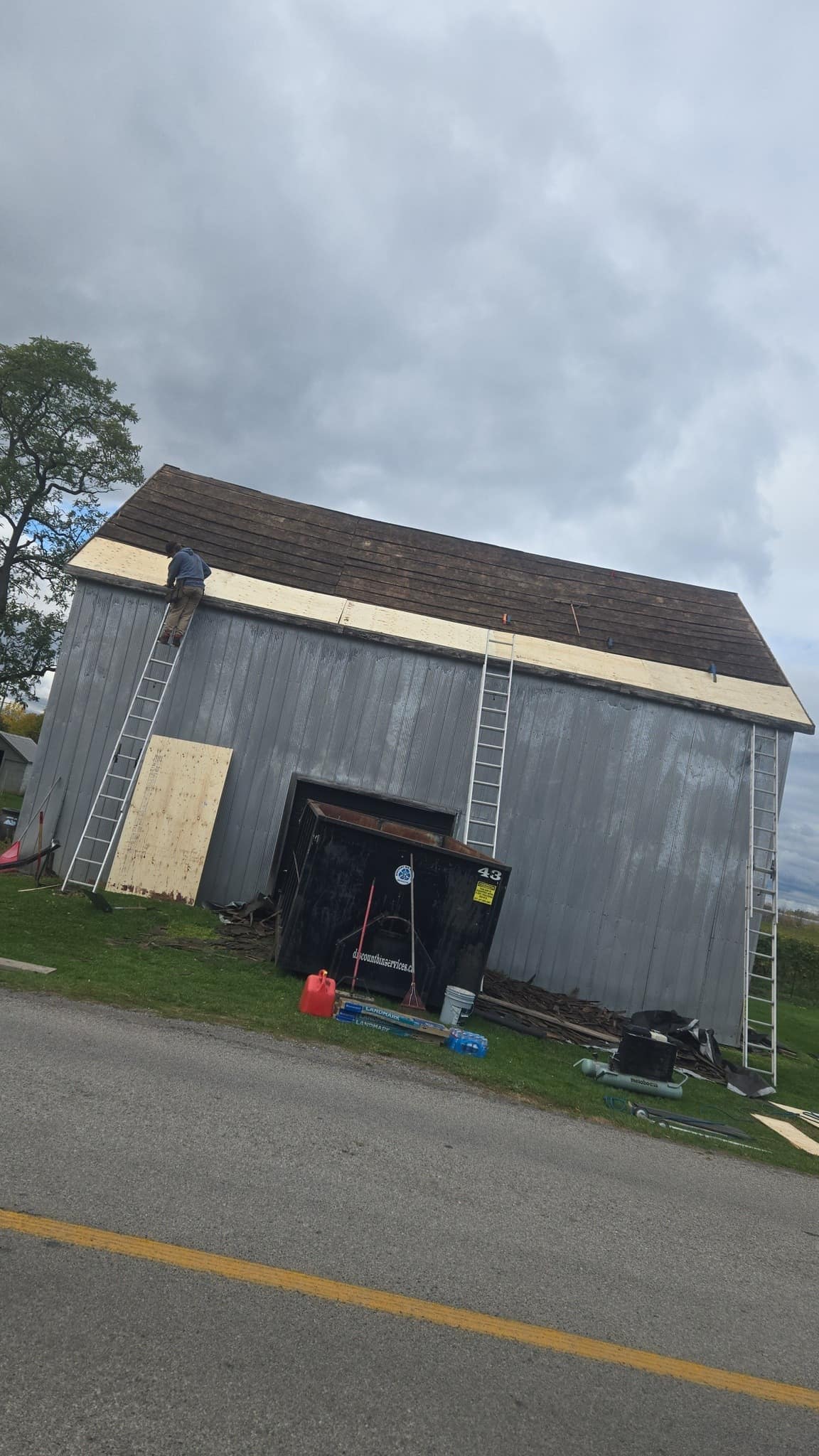 Street view of a completed residential roofing job